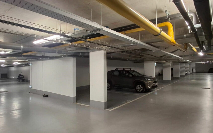 Parking de 13 m2 dans un bel immeuble récent