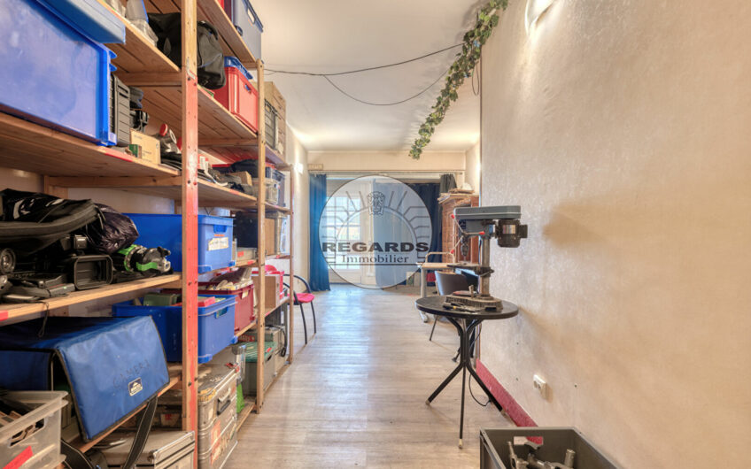Quartier de l’horloge – Mur de boutique libre