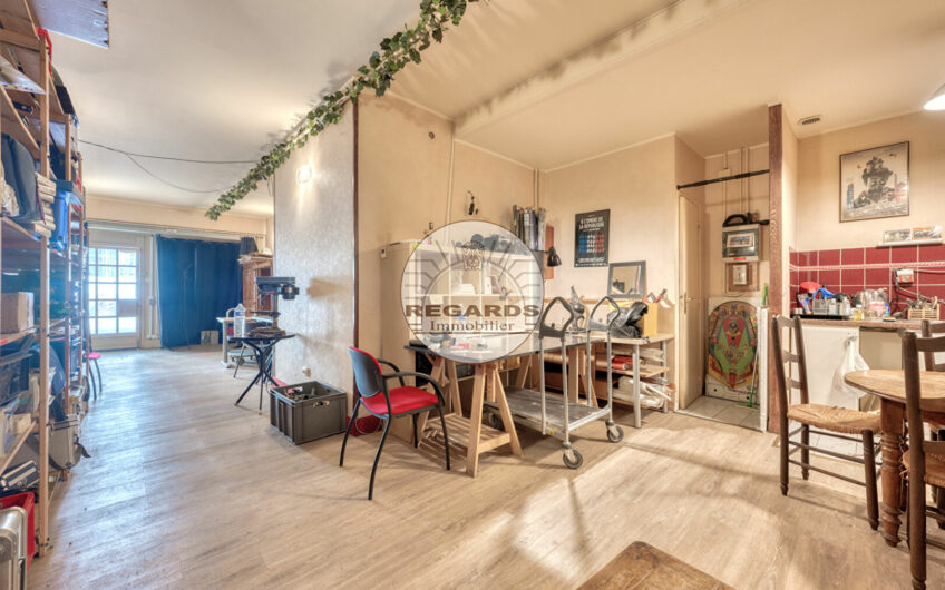 Quartier de l’horloge – Mur de boutique libre