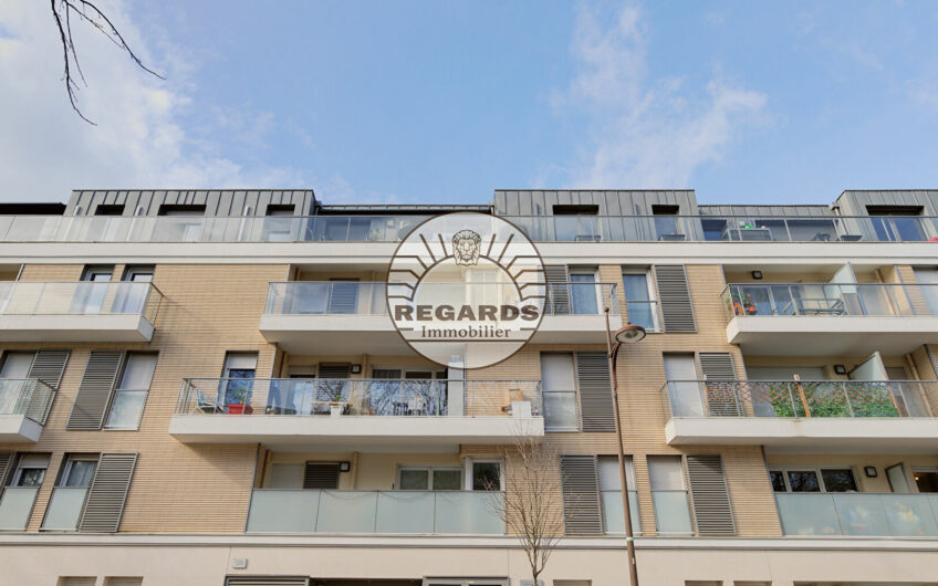 Parking de 13 m2 dans un bel immeuble récent