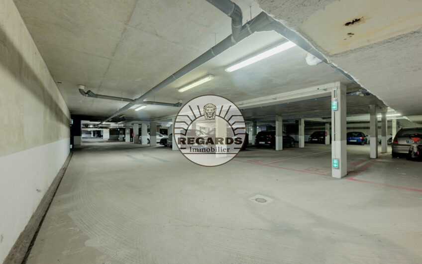 Parking de 13 m2 dans un bel immeuble récent